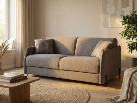 Modern sovesofa fra Dienne i skandinavisk interiør, vist med rene linjer og avrundede armlener.